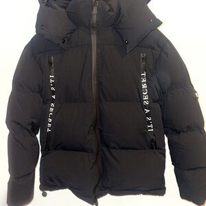 Black Trapstar Puffer Jacket X “that’s an awful lot of cough syrup” edition